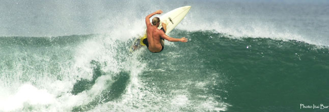 Women's surf school surf instructor tommy surfing pavones costa rica